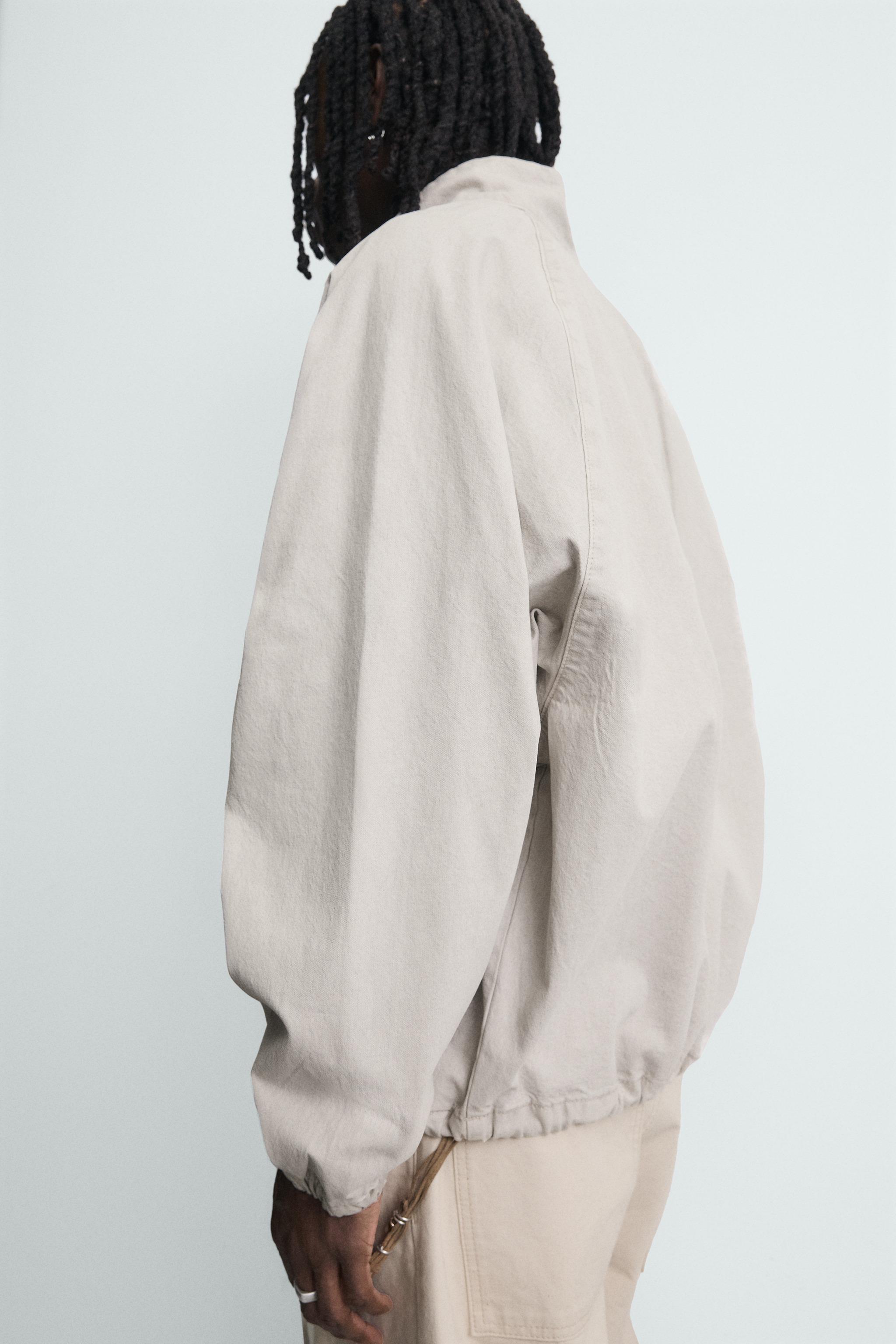 ZIPPERED POUCH POCKET SWEATSHIRT